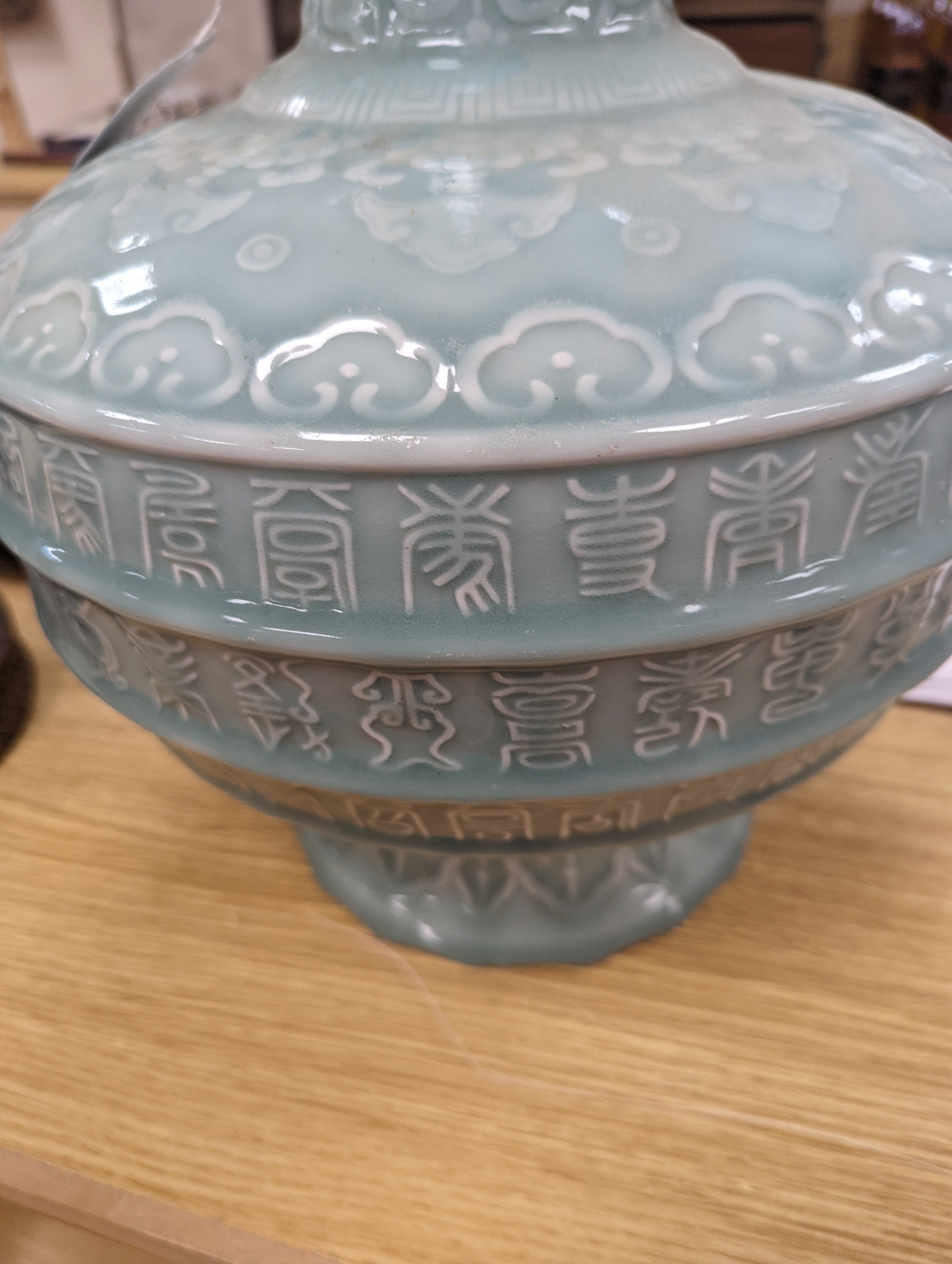 A large Chinese celadon glazed ‘Hundred Shou’ vase 41cm